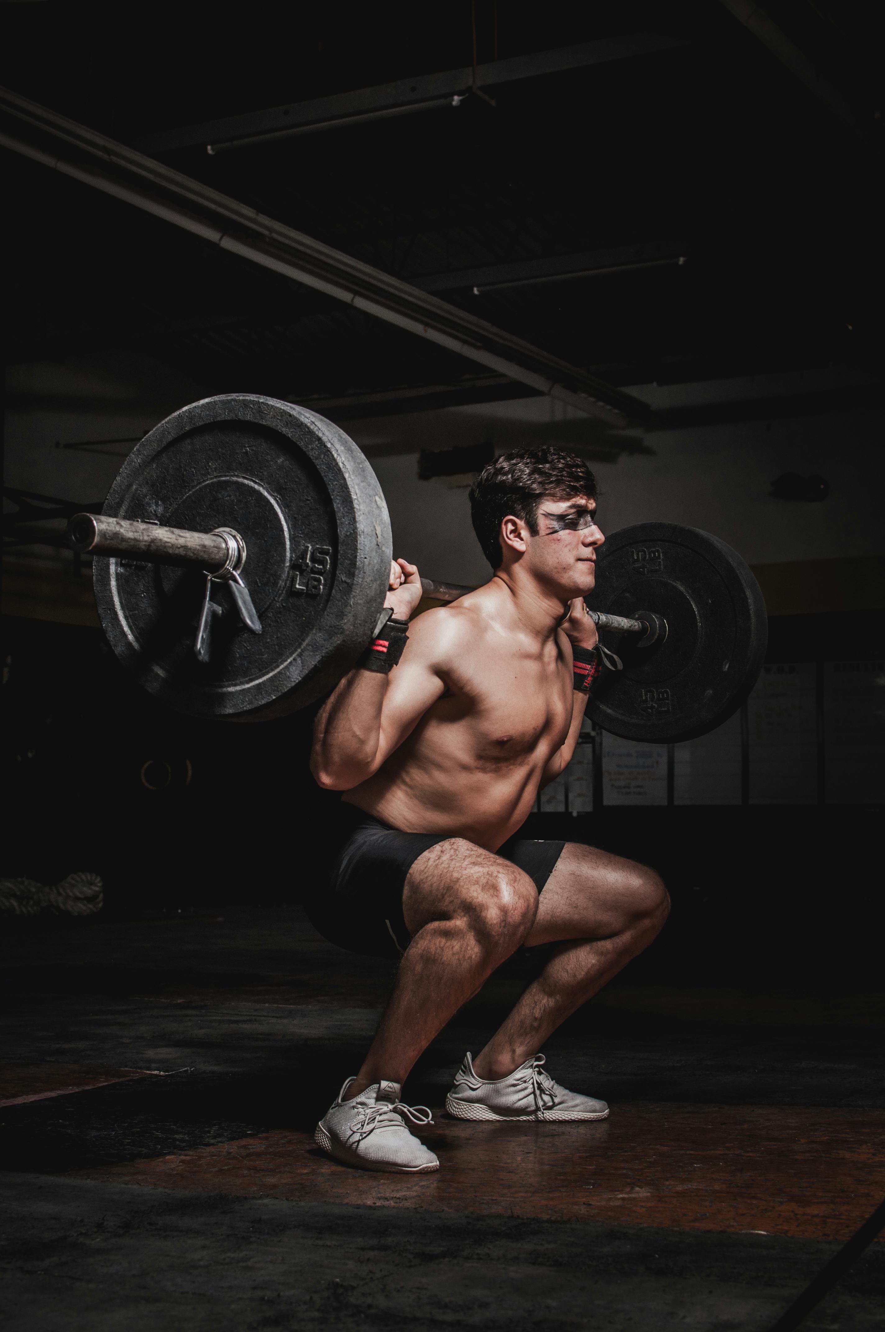 Male Athlete Squatting