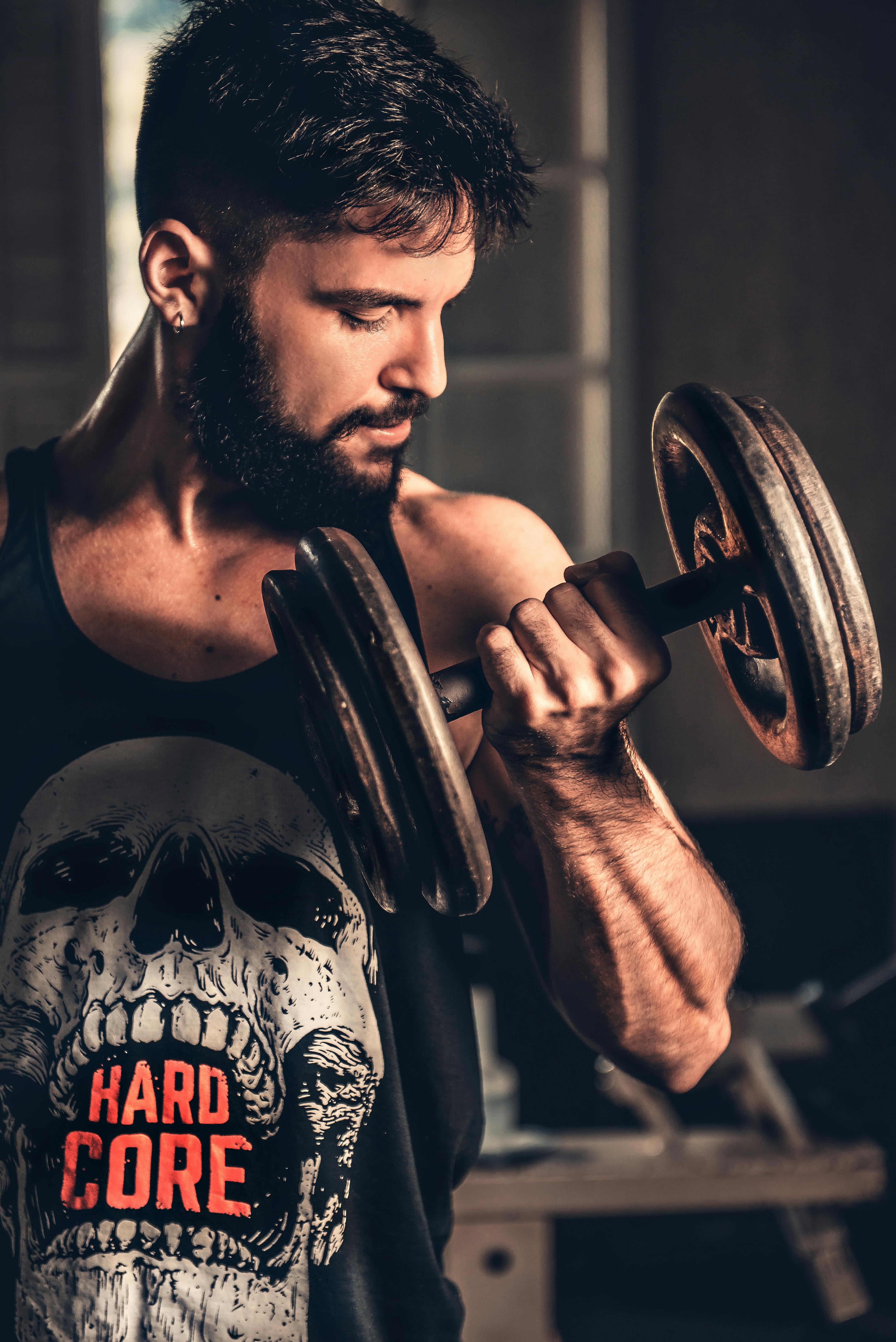 Male Athlete Curling Weights
